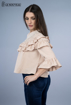 Picture of A blouse with sleeves, clush